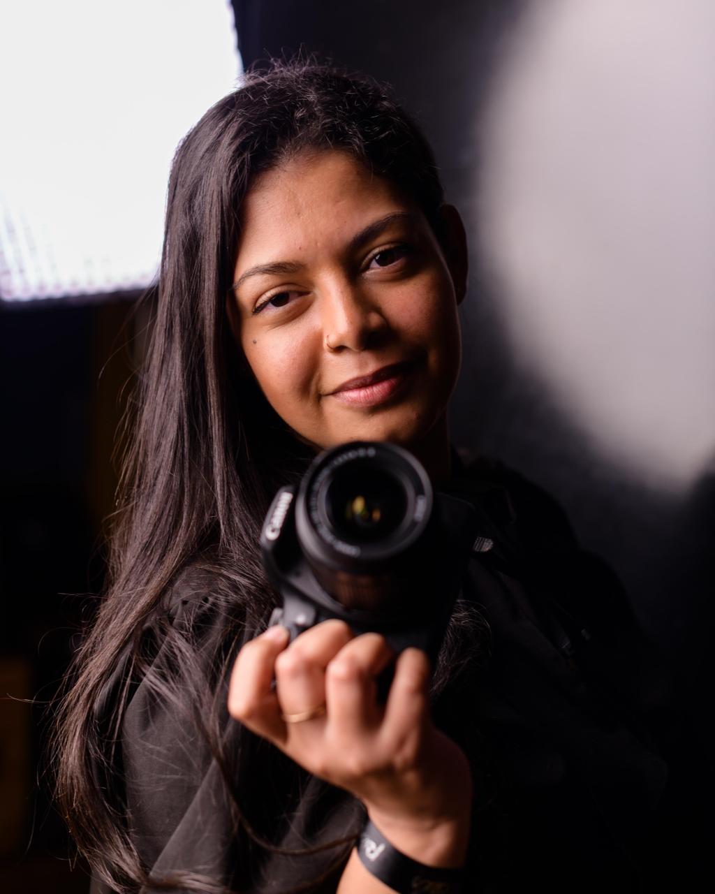 Michelle Santos, fotógrafa